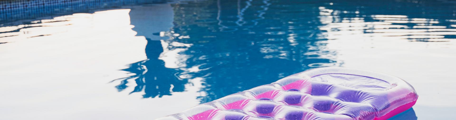 Pool with purple floating mat