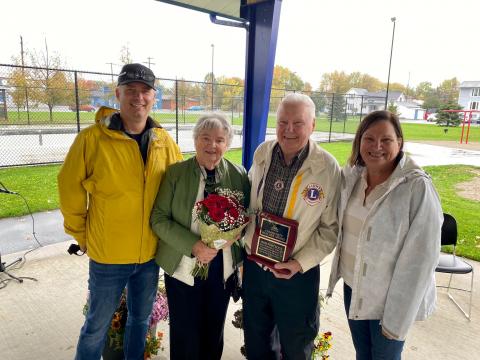 Bob Porteous and his wife Jean (center) stand with their children, Ian (left) and Laurie (right), after the award ceremony on Saturday. 